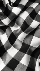 A monochromatic iPhone wallpaper featuring a black and white checkered pattern with a wavy distortion giving a three-dimensional appearance.