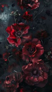 An iPhone wallpaper depicting dark, moody red flowers on a black background, creating a dramatic and intense visual.