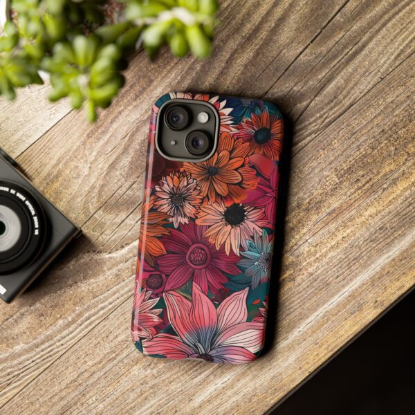 Maximalist Floral Pattern Phone Tough Case on a wooden surface.