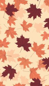 A seamless pattern of maple leaves in shades of cream, orange, and deep red, layered over a soft peach background, creating a warm and inviting fall-themed wallpaper.